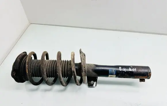 Volkswagen Touran II Front shock absorber with coil spring 
