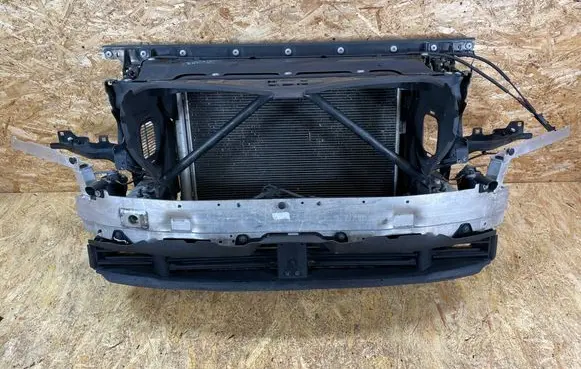 Radiator support slam panel