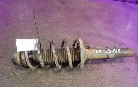 Volkswagen Golf IV Front shock absorber with coil spring