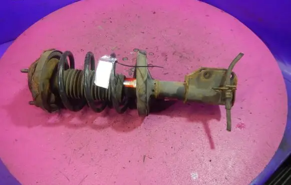 Mazda 323 Front shock absorber with coil spring