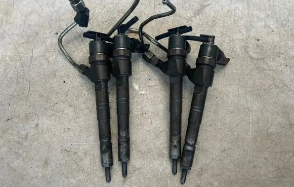 Opel Astra J Fuel injectors set 0445110327