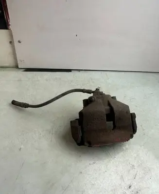 Volkswagen PASSAT B6 Front brake caliper 654