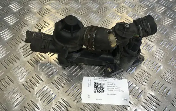 Thermostat/thermostat housing