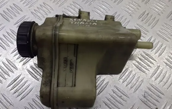 Renault Thalia I Power steering fluid tank/reservoir 770414664