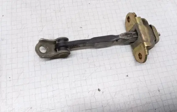 Nissan Almera N16 Rear door check strap stopper