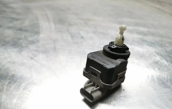 Opel Astra G Headlight level adjustment motor 90590665