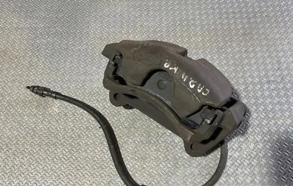 Volkswagen Caddy Front brake caliper