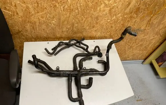 Volkswagen Jetta VI Engine coolant pipe/hose 04E121070J 5C0121109C 5C0122051J