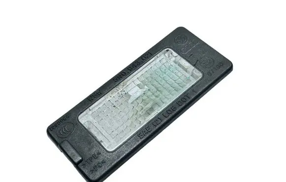 Volkswagen Jetta VI Number plate light 5N0943021
