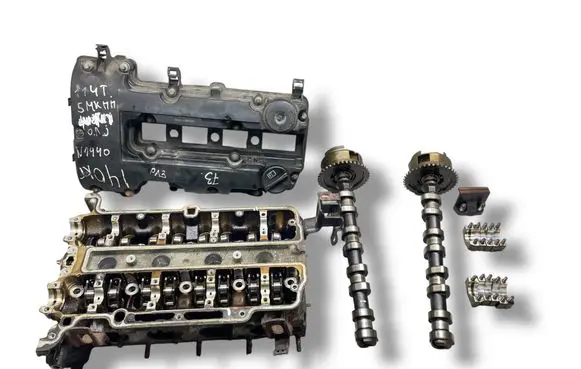 Opel Astra J Engine head 55562229 A14XER