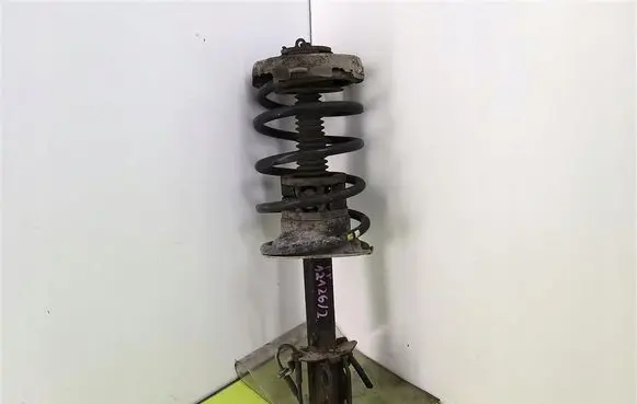 Renault Megane I Front shock absorber with coil spring 7700412915A