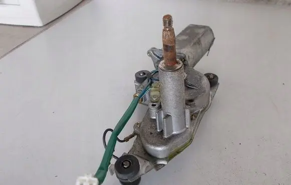 Mazda 323 F Rear window wiper motor 8491009856