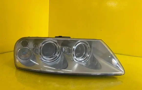 Volkswagen Touran I Headlight/headlamp 7L6941016BK