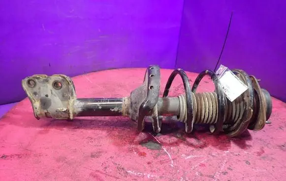 Subaru Outback Front shock absorber with coil spring 339240