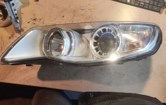 Volkswagen Touareg I Headlight/headlamp 7L6941031