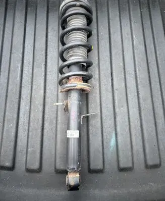 Infiniti M30 Rear shock absorber with coil spring 561101MT0A