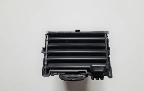 Nissan Leaf I (ZE0) Dash center air vent grill 687513NA0A
