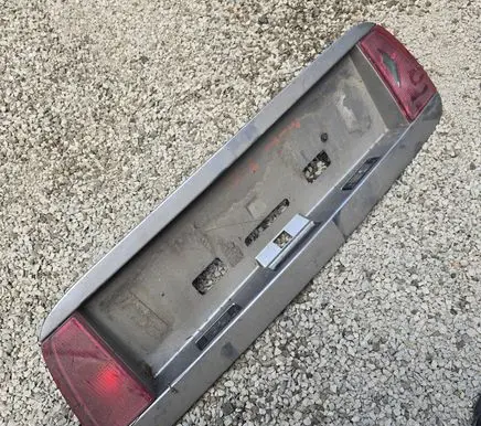 Nissan Primera Trunk door license plate light bar 90810AU400