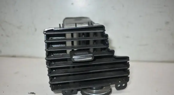 Dash center air vent grill