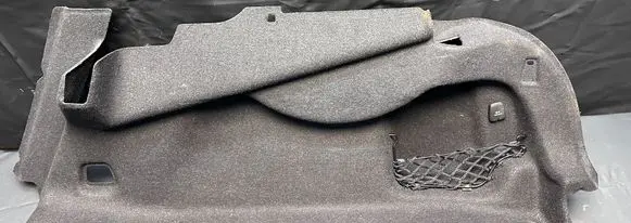 Trunk/boot lower side trim panel