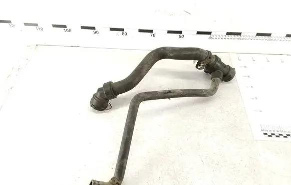 Volkswagen PASSAT B5 Engine coolant pipe/hose 4B0121049S