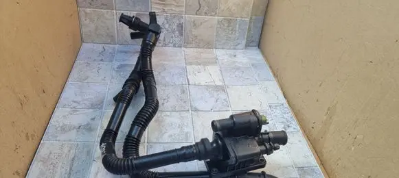 Thermostat/thermostat housing