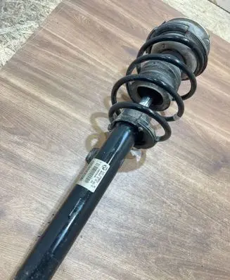 Front shock absorber with coil spring