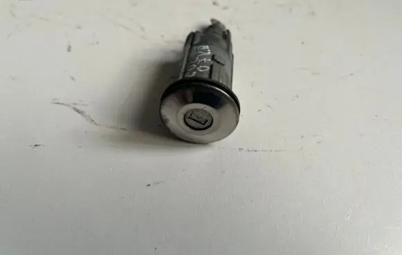 Mitsubishi Colt Front door lock (next to the handle) 