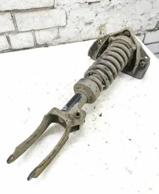 Volkswagen Touareg I Front shock absorber/damper 7L6412022N