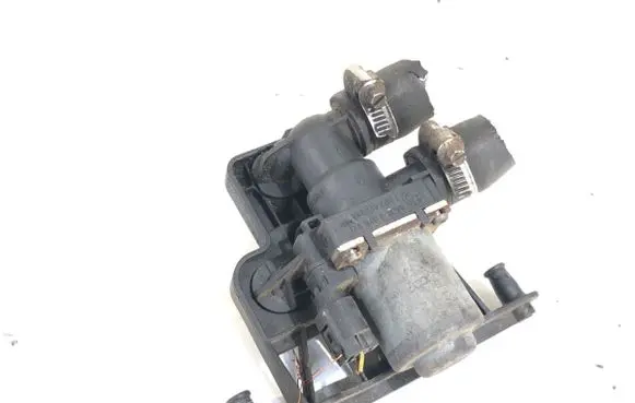 Coolant heater control valve
