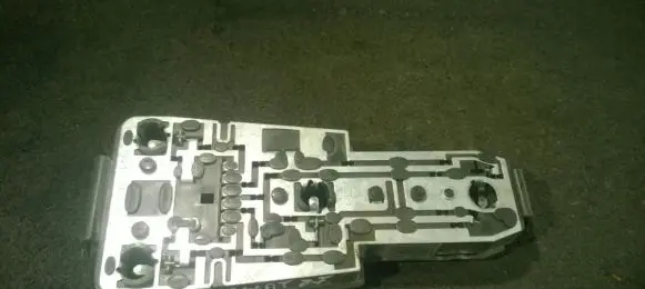 Tail light bulb cover holder