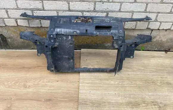 Radiator support slam panel