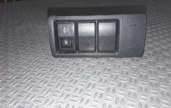 Headlight level height control switch