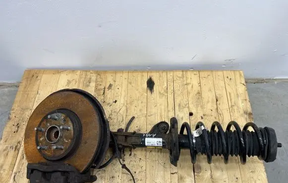 Front shock absorber with coil spring