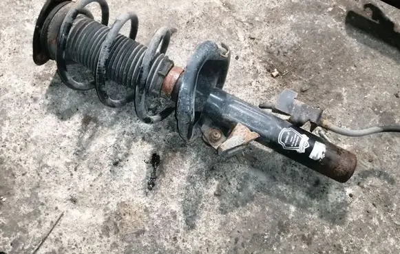 Mazda 3 I Front shock absorber with coil spring