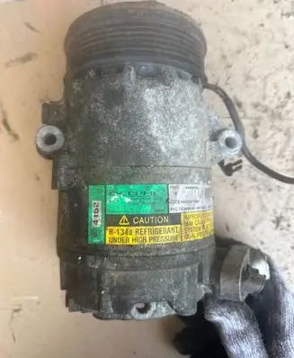 Opel Zafira A Air conditioning (A/C) compressor (pump) 24464152