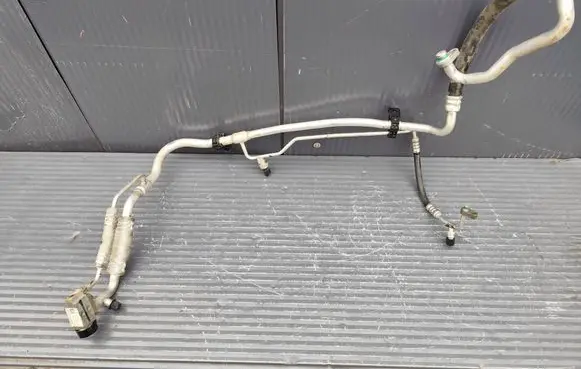 KIA Sportage Air conditioning (A/C) pipe/hose 97775CZ001