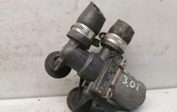 Coolant heater control valve