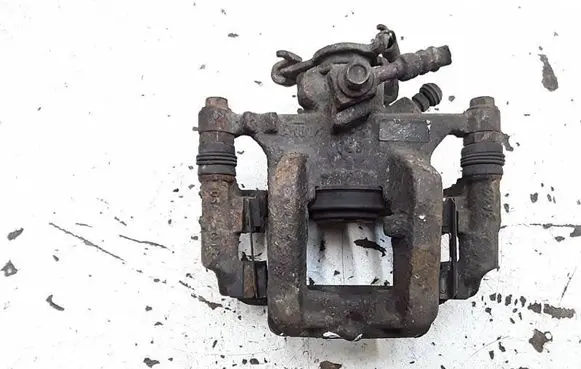 Opel Astra J Rear brake caliper