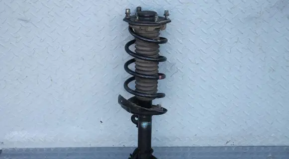 Front shock absorber with coil spring
