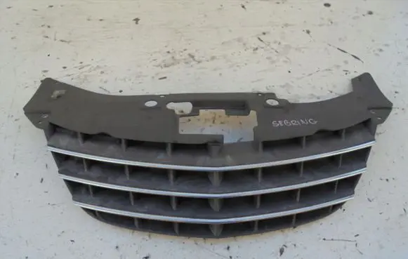 Chrysler Sebring (ST-22 - JR) Front bumper upper radiator grill HALOGENZALEPKA