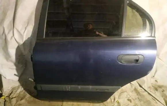 Mitsubishi Carisma Rear door MELYNOS