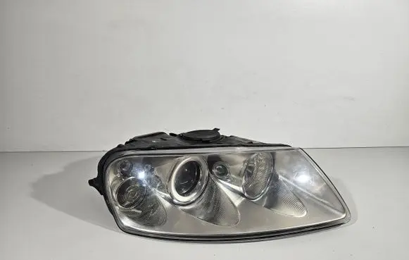Volkswagen Touareg I Headlight/headlamp 1097435847534