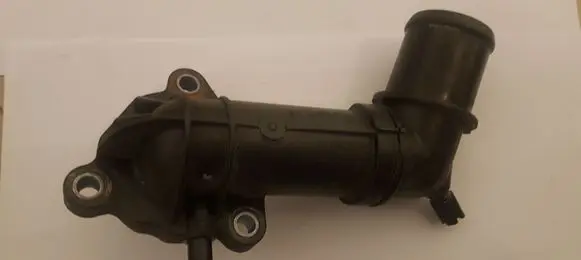 Thermostat/thermostat housing