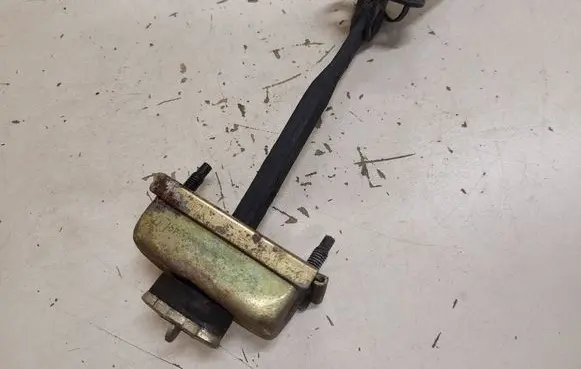 Jaguar S-Type Rear door check strap stopper