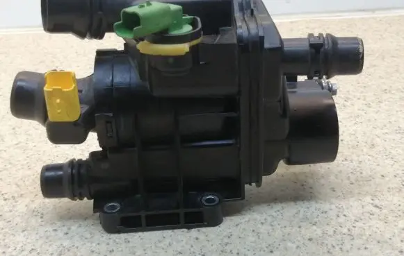 Thermostat/thermostat housing