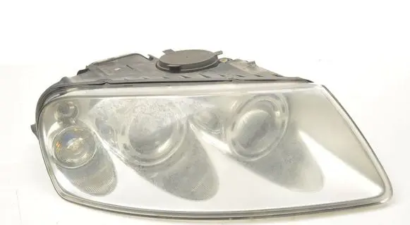 Volkswagen Touareg I Headlight/headlamp 7L6941016BK