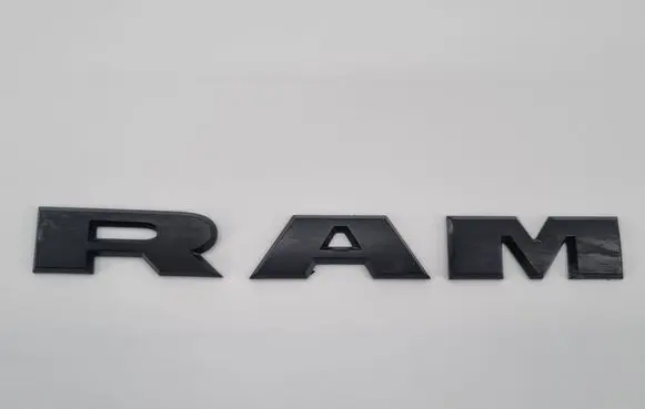 Ram 1500 Front door emblem/model letters 68302528AA 68309785AA