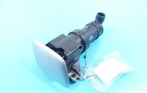 Headlight washer spray nozzle