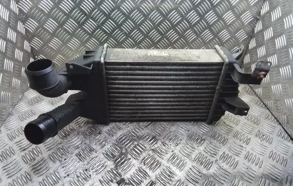 Opel Zafira B Intercooler radiator 13213402 WTP8630